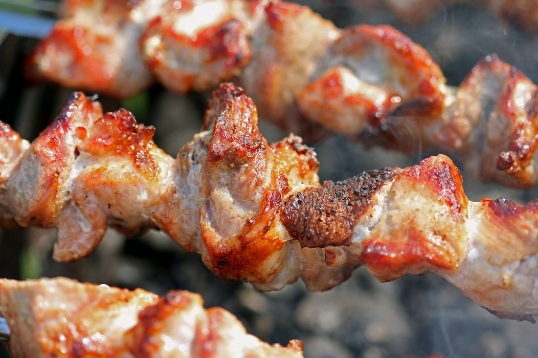 Charcoal-grilled lamb kebab skewers