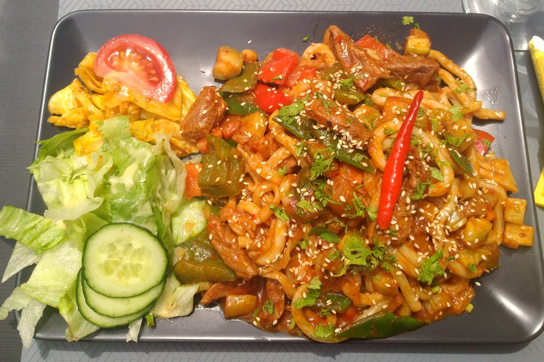 Lagman — hand-pulled noodles with beef and vegetables