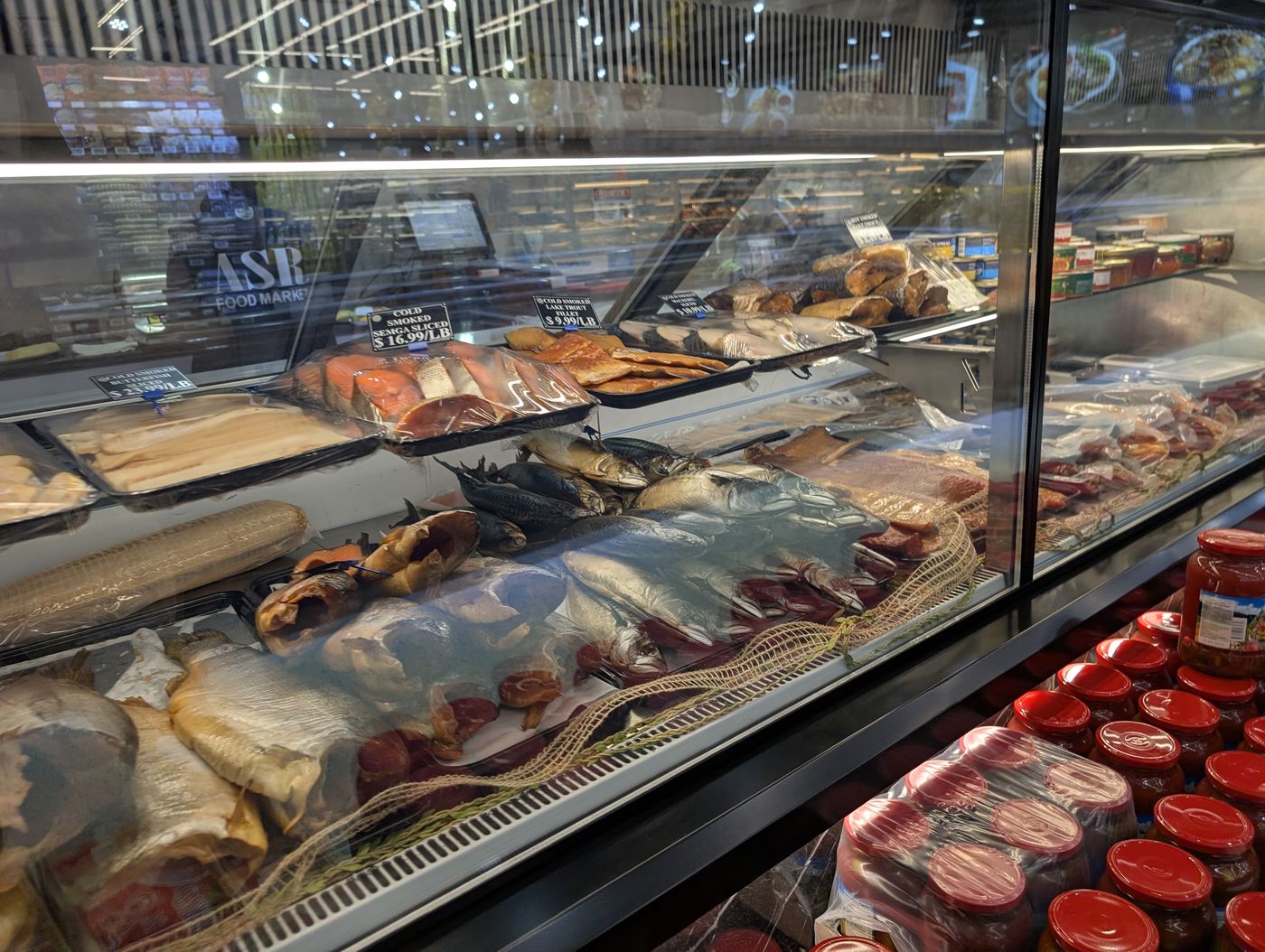 Service case with smoked fish at ASR Food Market