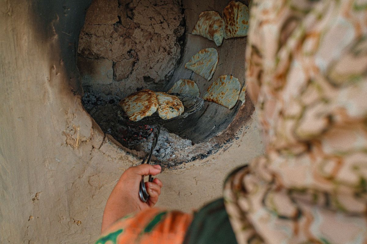Bread baking in a tandoor